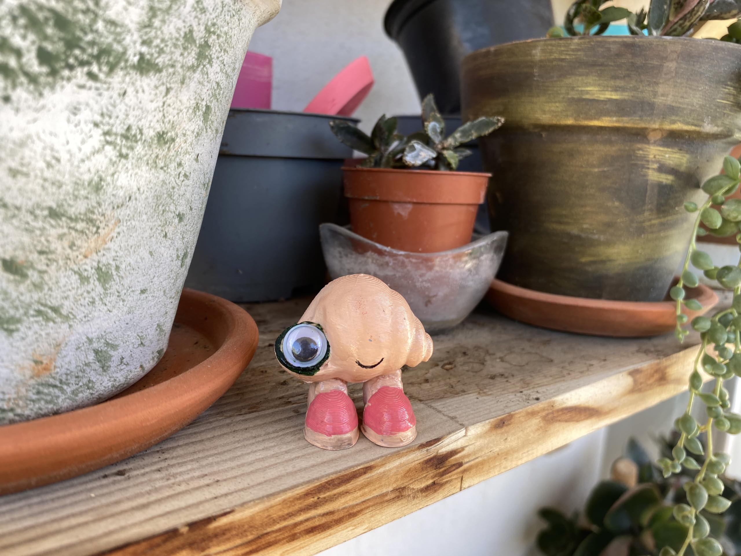 Marcel the Shell with Shoes On life-size figure presented as a thoughtful gift idea for fans.