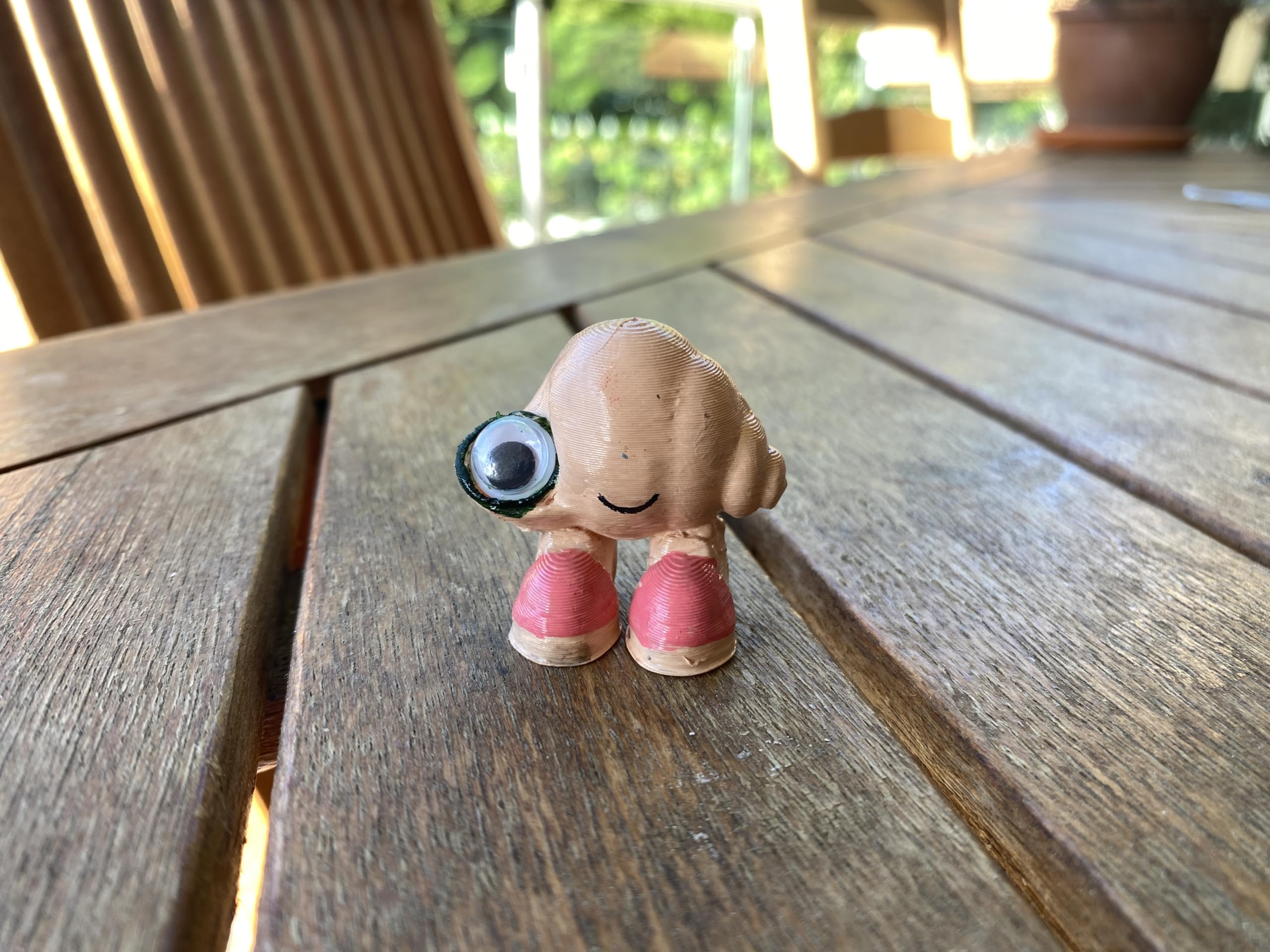 Marcel the Shell with Shoes On life-size figure 3D printed PLA sculpture captures vibrant features for unique home decor.