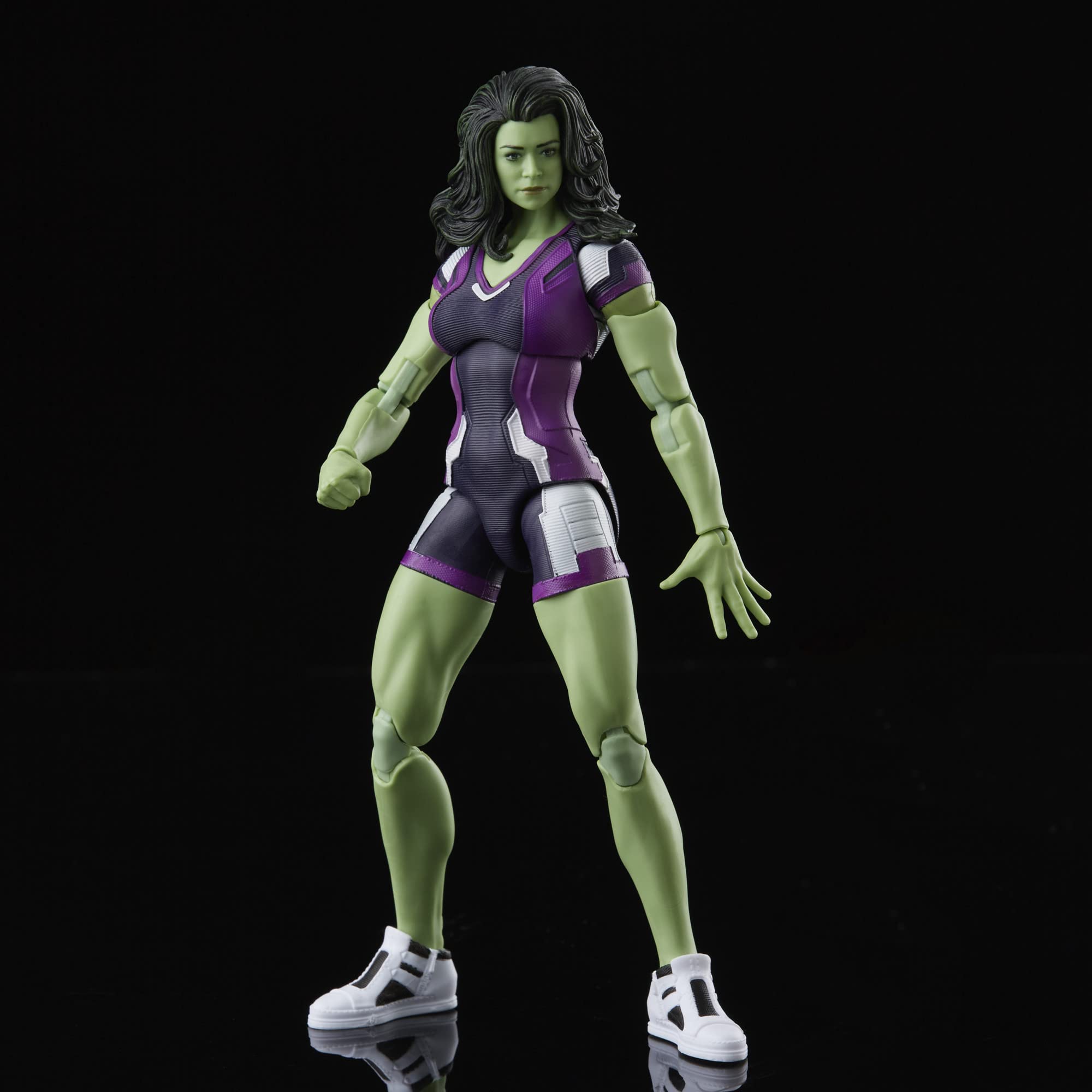 Marvel Legends She-Hulk figure with premium articulation for dynamic poses.