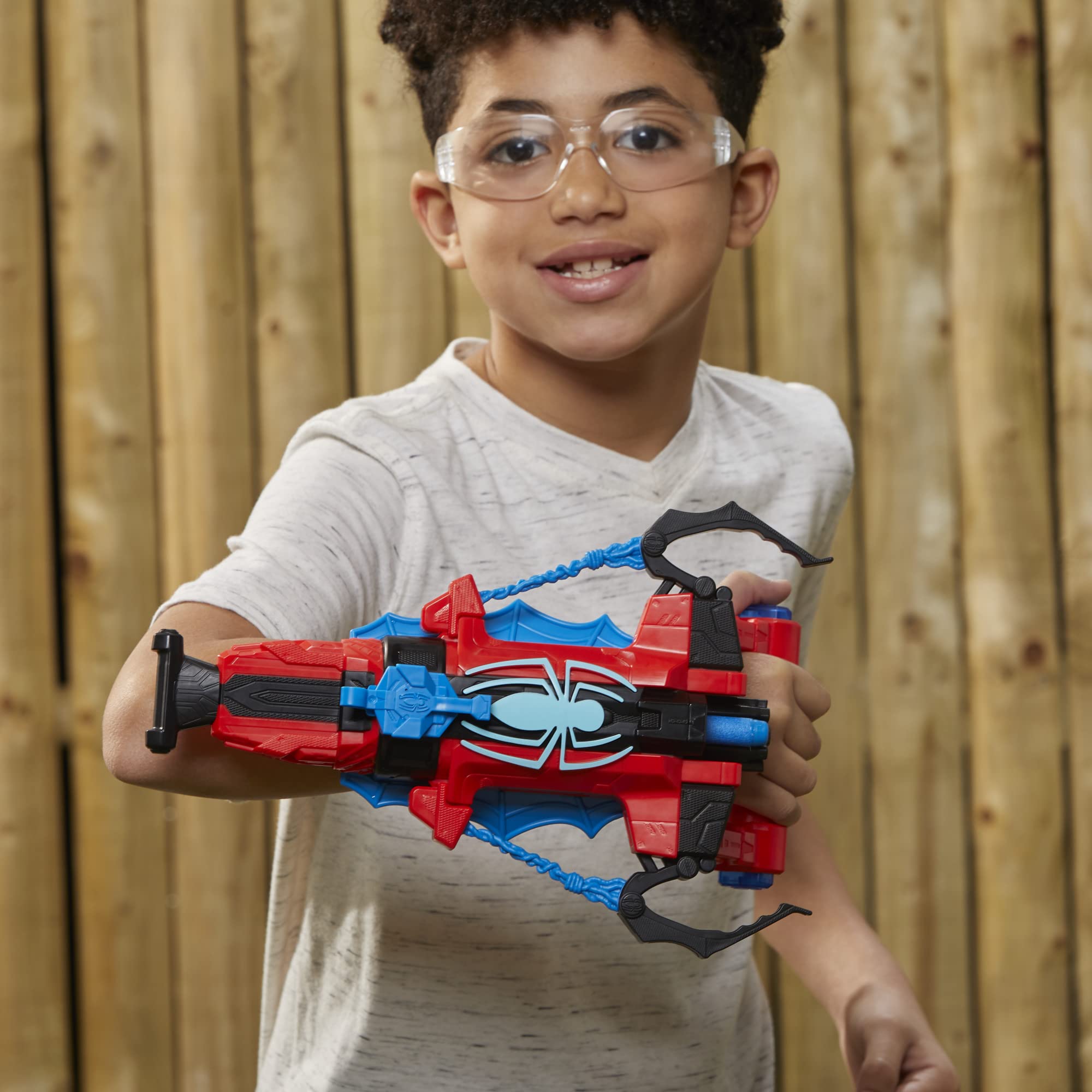 Outdoor-friendly Nerf blaster in Spider-Man colors for backyard adventures.