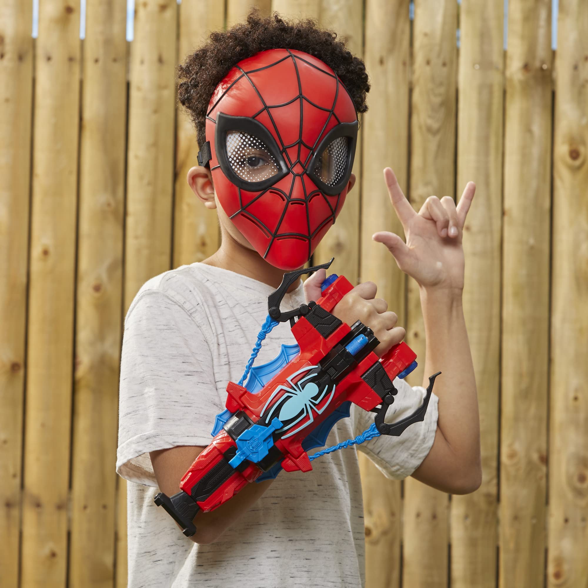 Marvel branding and web motif enhances superhero play.