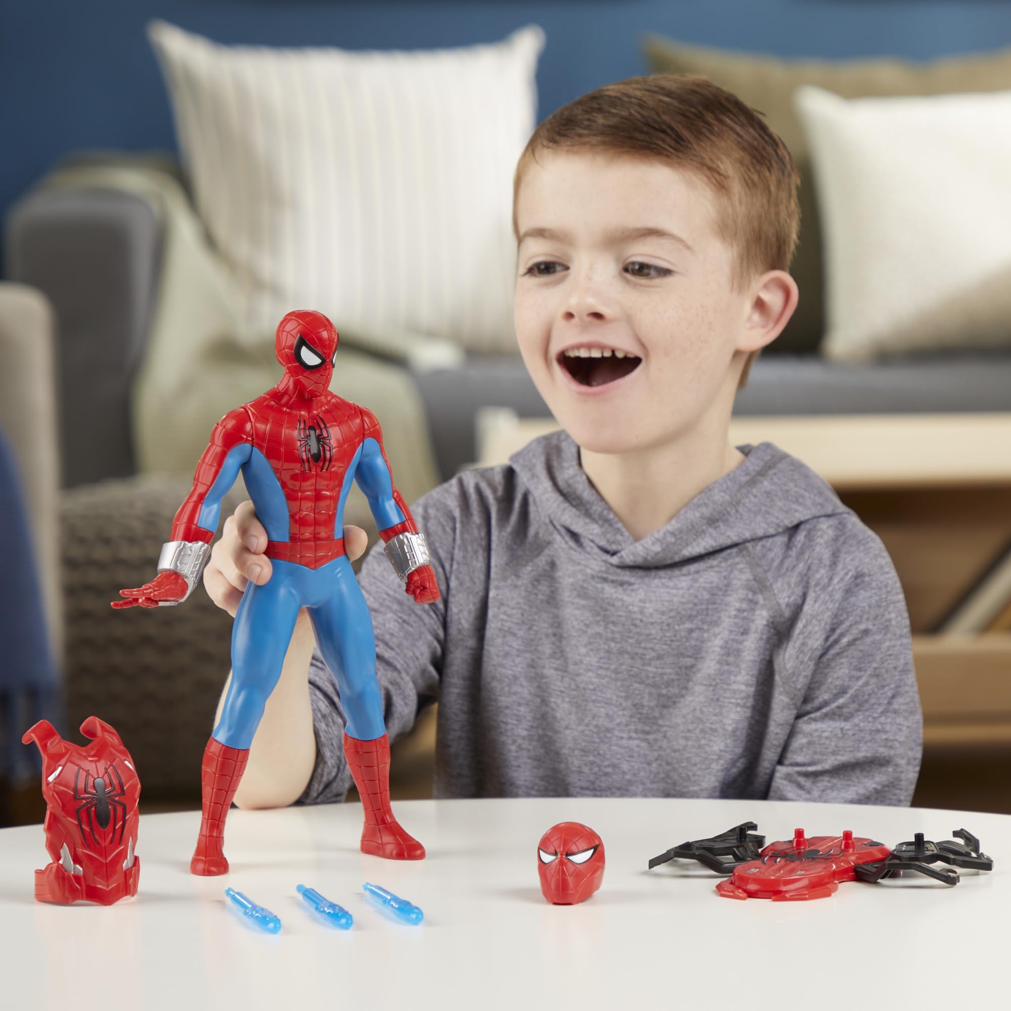 Marvel Spider-Man twist-action pose highlights the thwip blast feature for play.