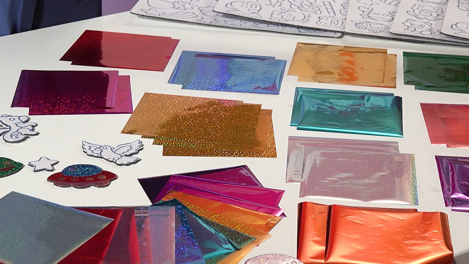 Marvin's Magic Foil Rainbow Stickers inside view highlighting 150 stickers for crafts