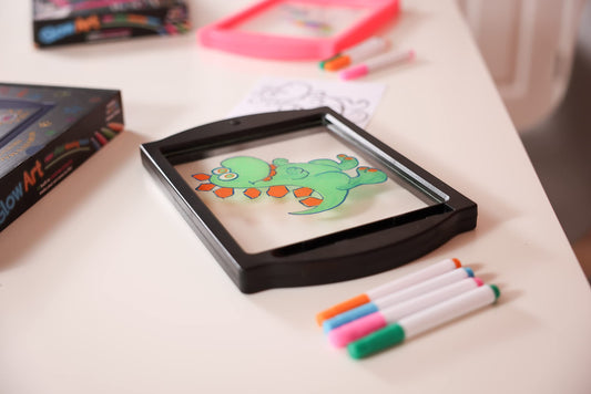 Marvin's Magic Glow Art neon pens illuminate vibrant outlines for glowing art.