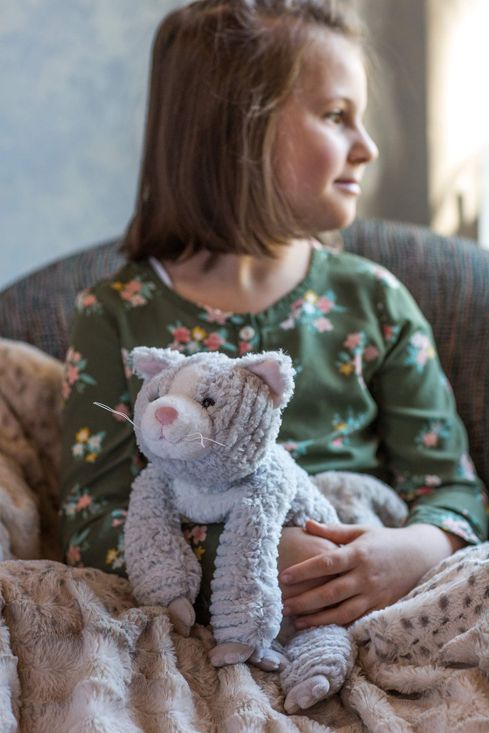Mary Meyer Cozy Toes Cat ears perky and whiskers, adding personality for pretend play.