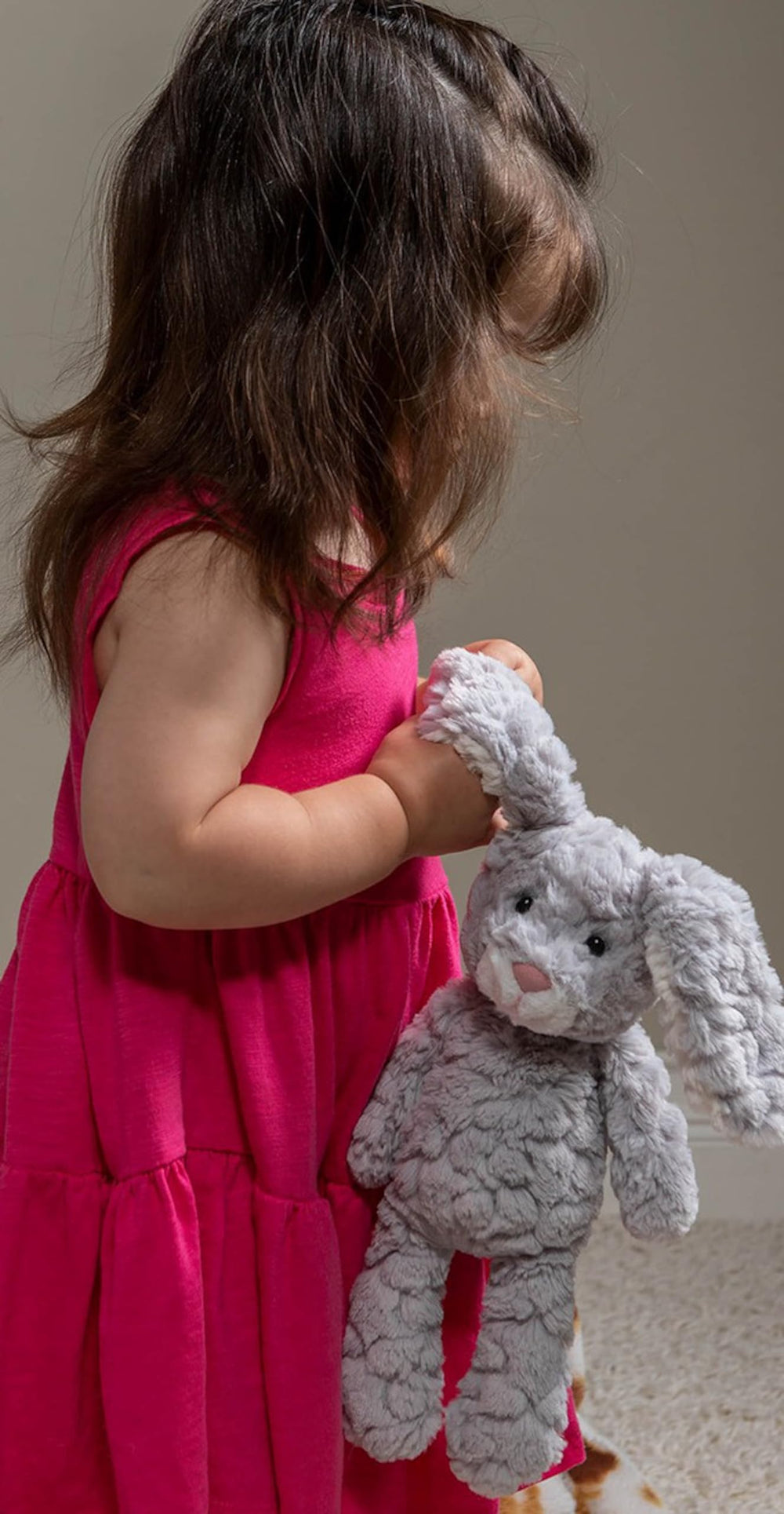 Mary Meyer Shadow Putty Bunny floppy ears enhance cuddly, friendly expression.