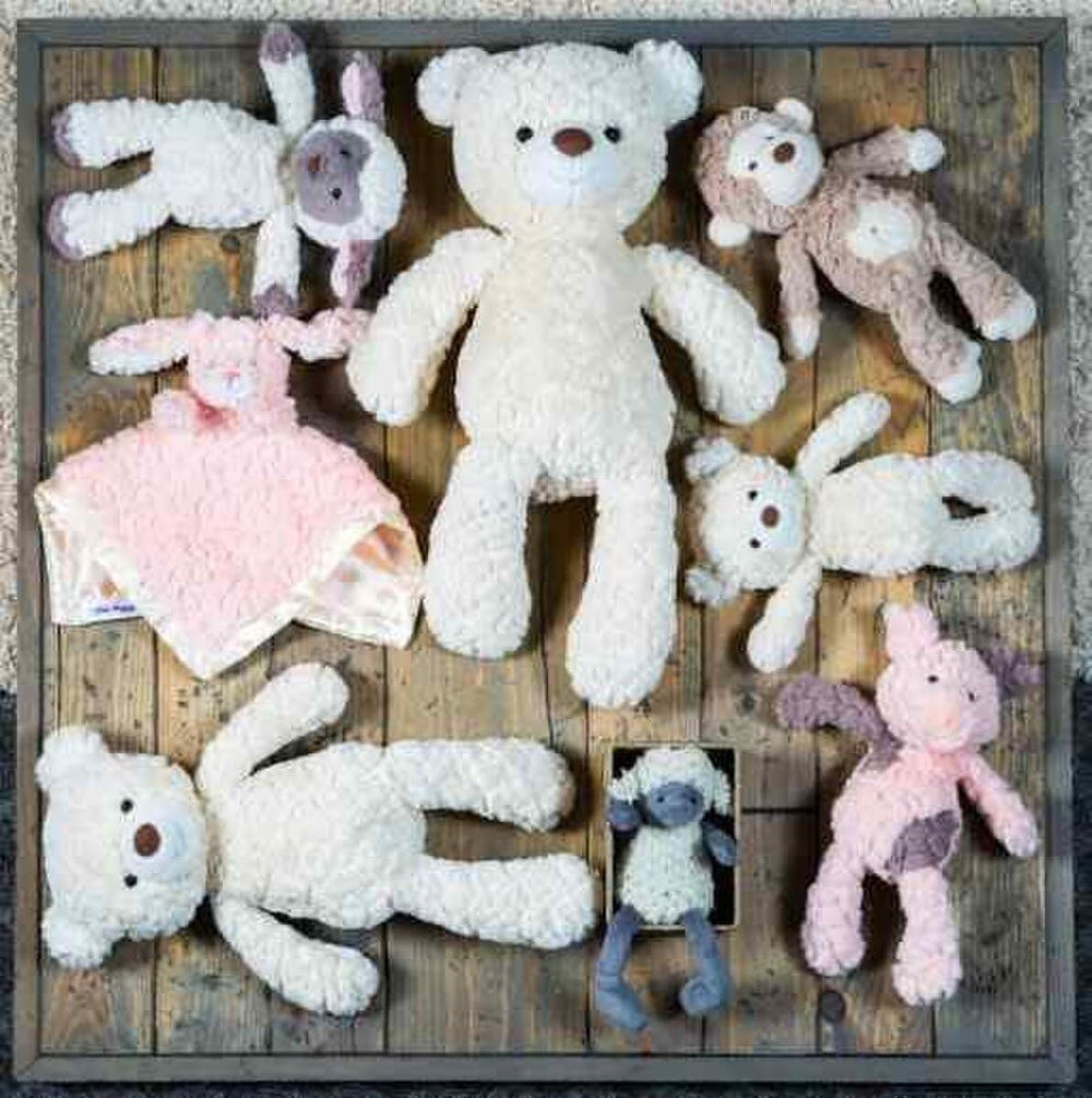 Putty Lamb's weighted bum and feet provide a grounded snuggle