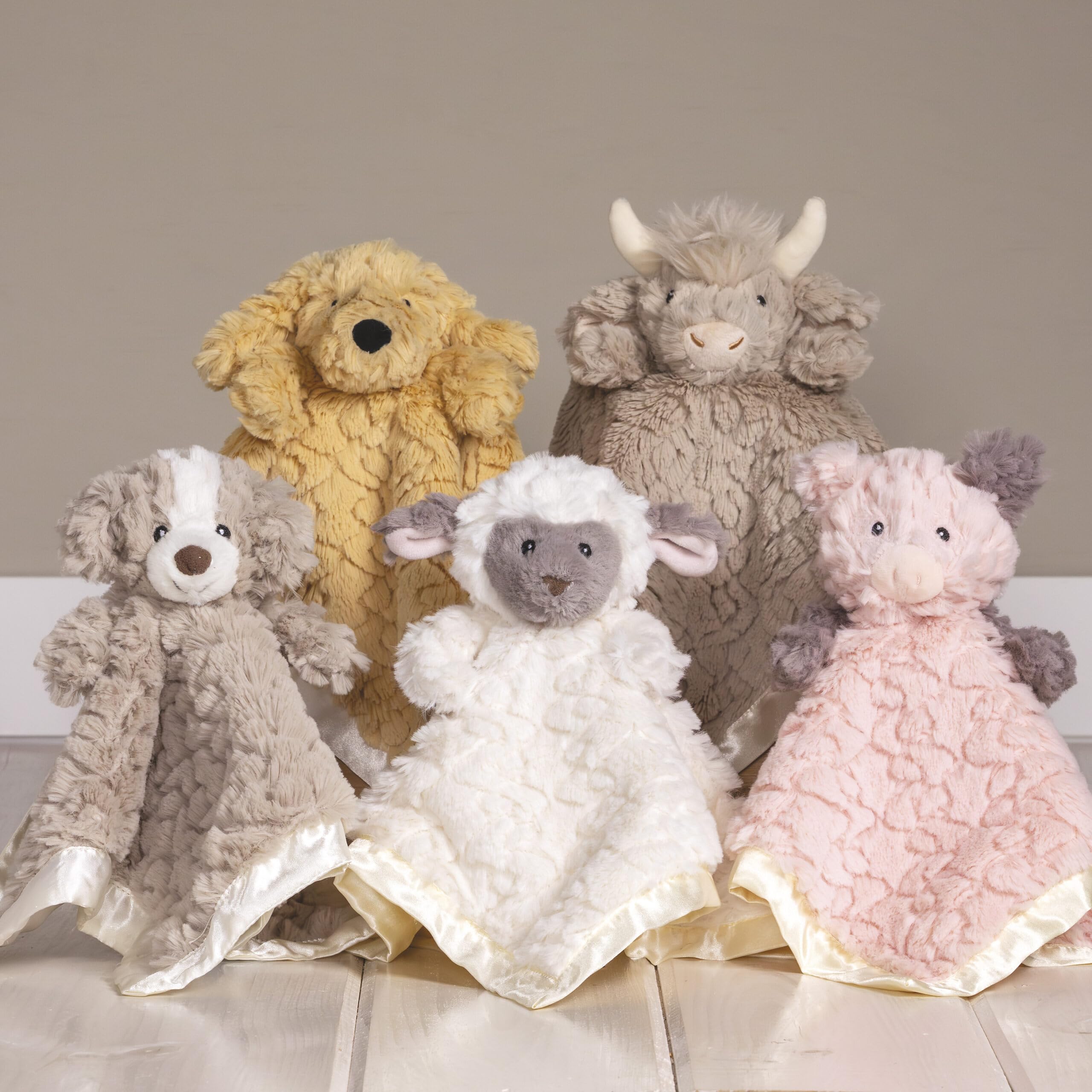 Mary Meyer Putty Nursery Hound Blanket satin underside delivers smooth warmth.