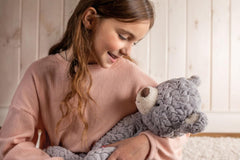 Mary Meyer Putty Shadow Bear soft fabric texture for sensory comfort.