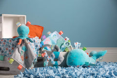 Mary Meyer Taggies crinkle and squeaker stimulate baby's auditory and tactile senses.