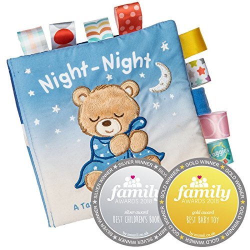 Mary Meyer Taggies Starry Night Teddy Soft Book in baby's hands during storytime