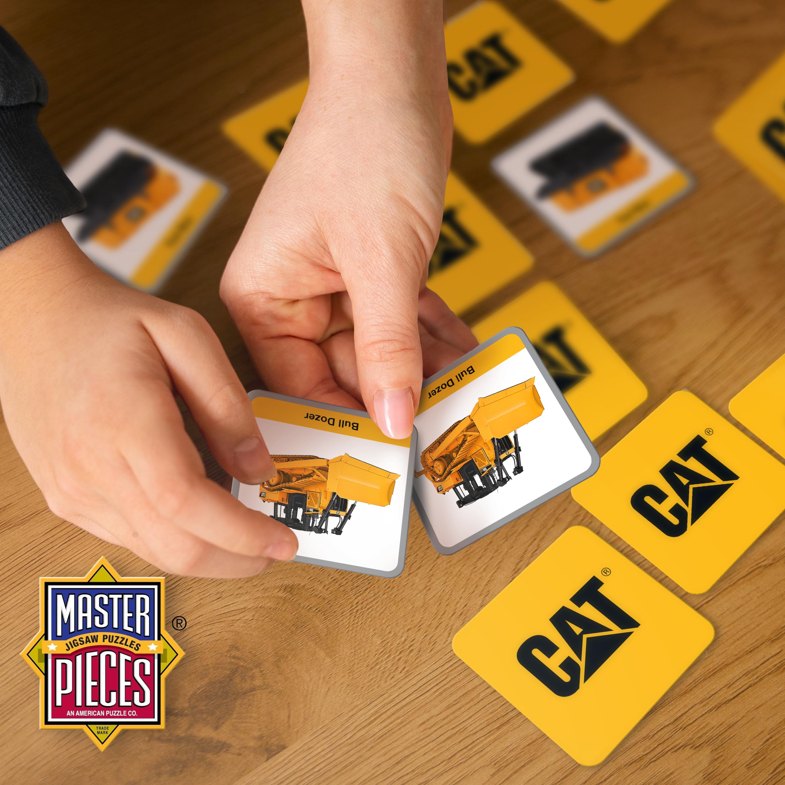 MasterPieces official Caterpillar licensed product packaging, authentic branding.