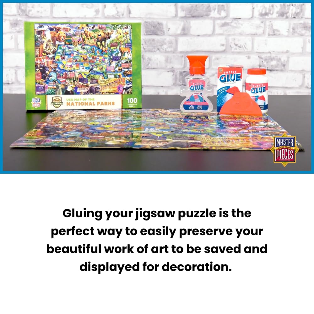 MasterPieces puzzle glue spreader used for precise coverage on a puzzle.