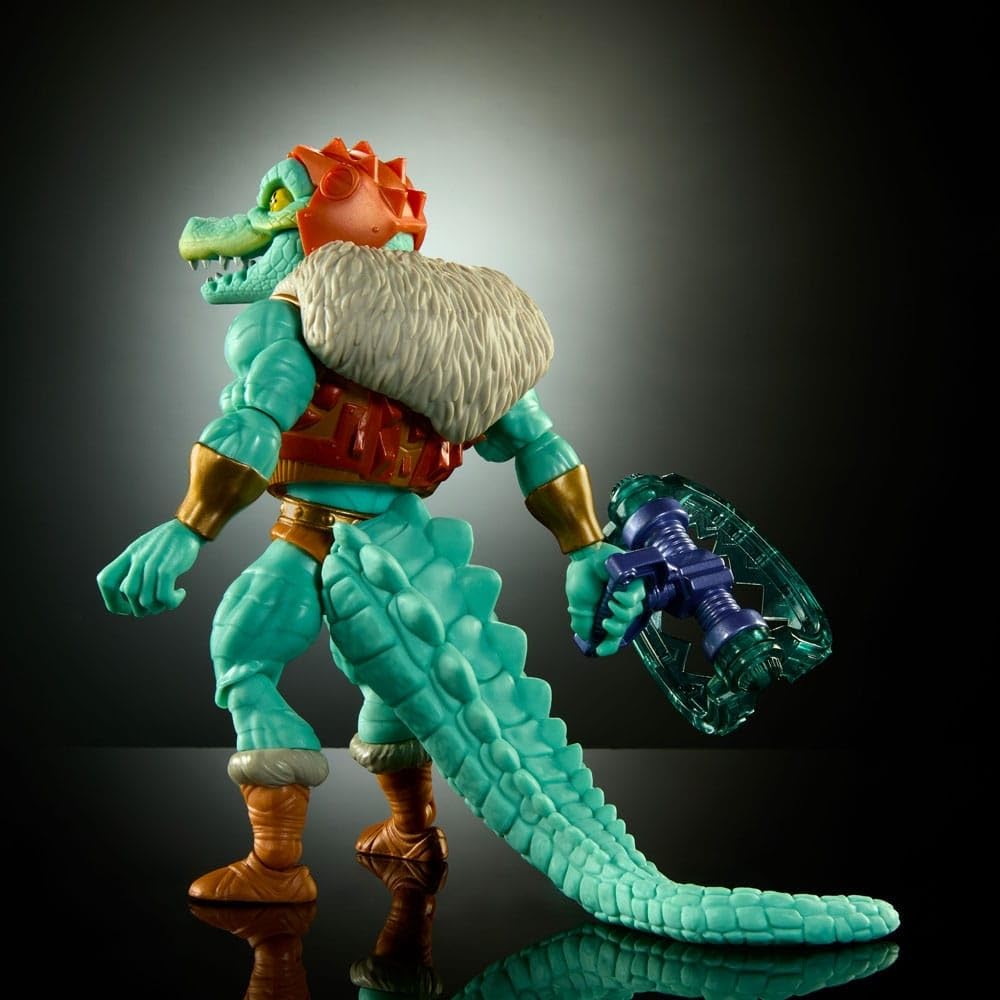 Masters of the Universe Leatherhead kneeling pose shows action-ready play potential.