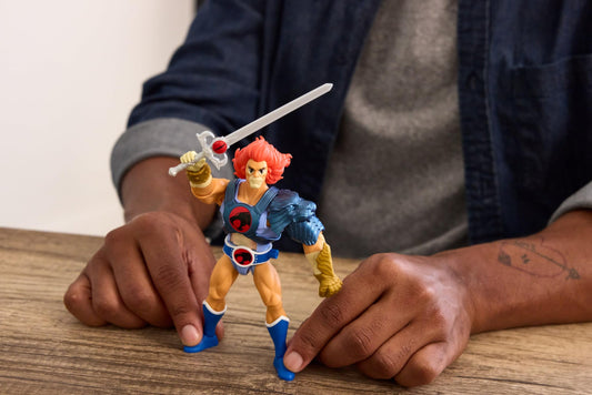 Masters of the Universe Lion-O with Sword of Omens and Eye of Thundera jewel visible.