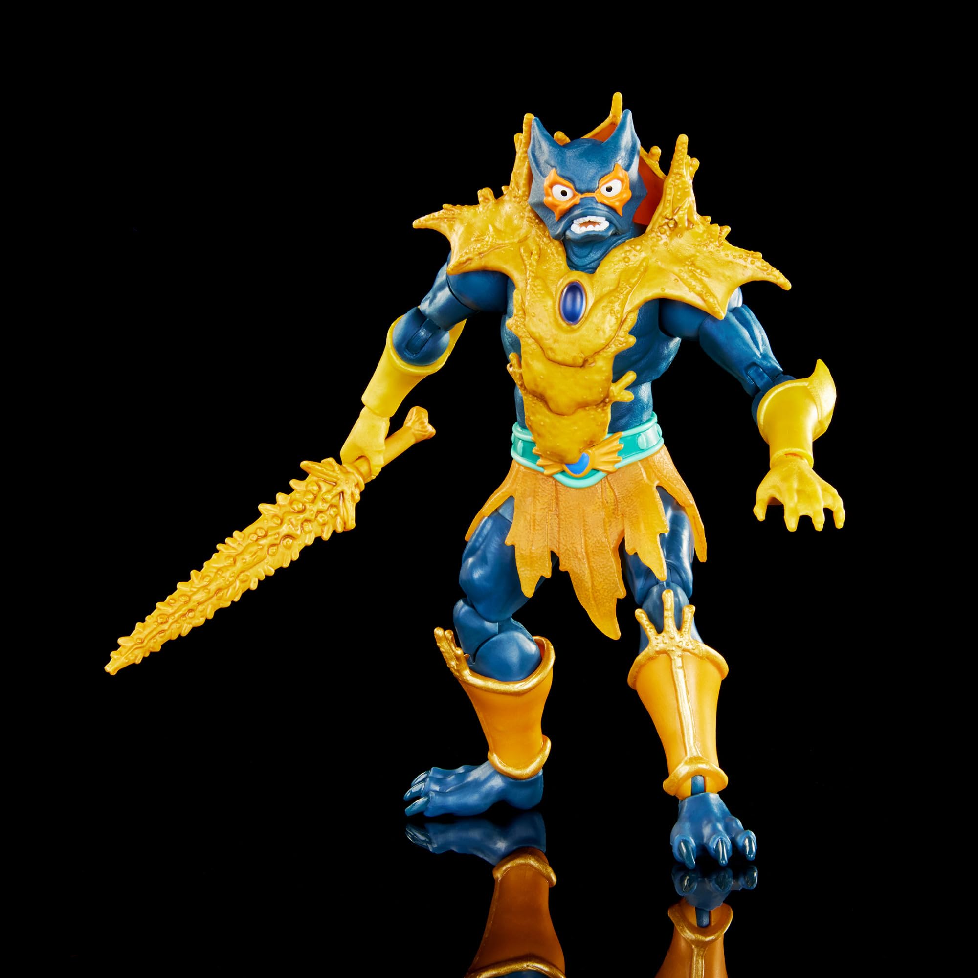 Removable chest armor on Mer-Man for customizable styling of MOTU figure.