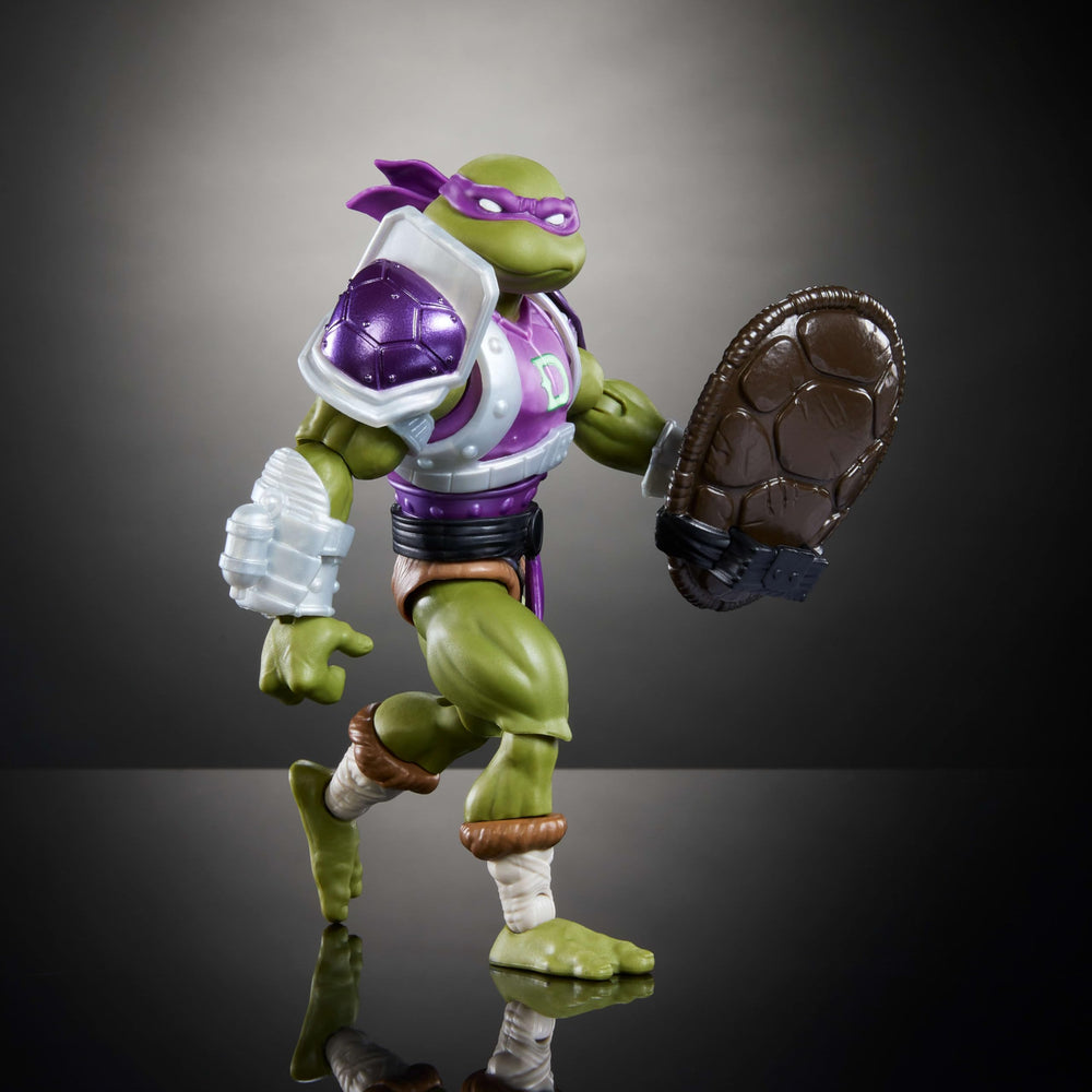 Gift-ready MOTU TMNT crossovers with modular gear for collectors.
