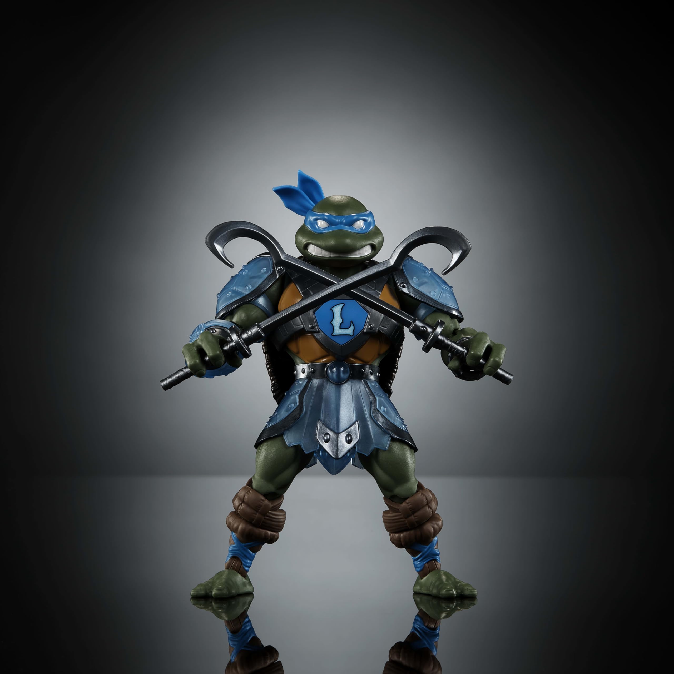 Masters of the Universe Origins Leonardo swords with capture hooks for snake-wrangling.