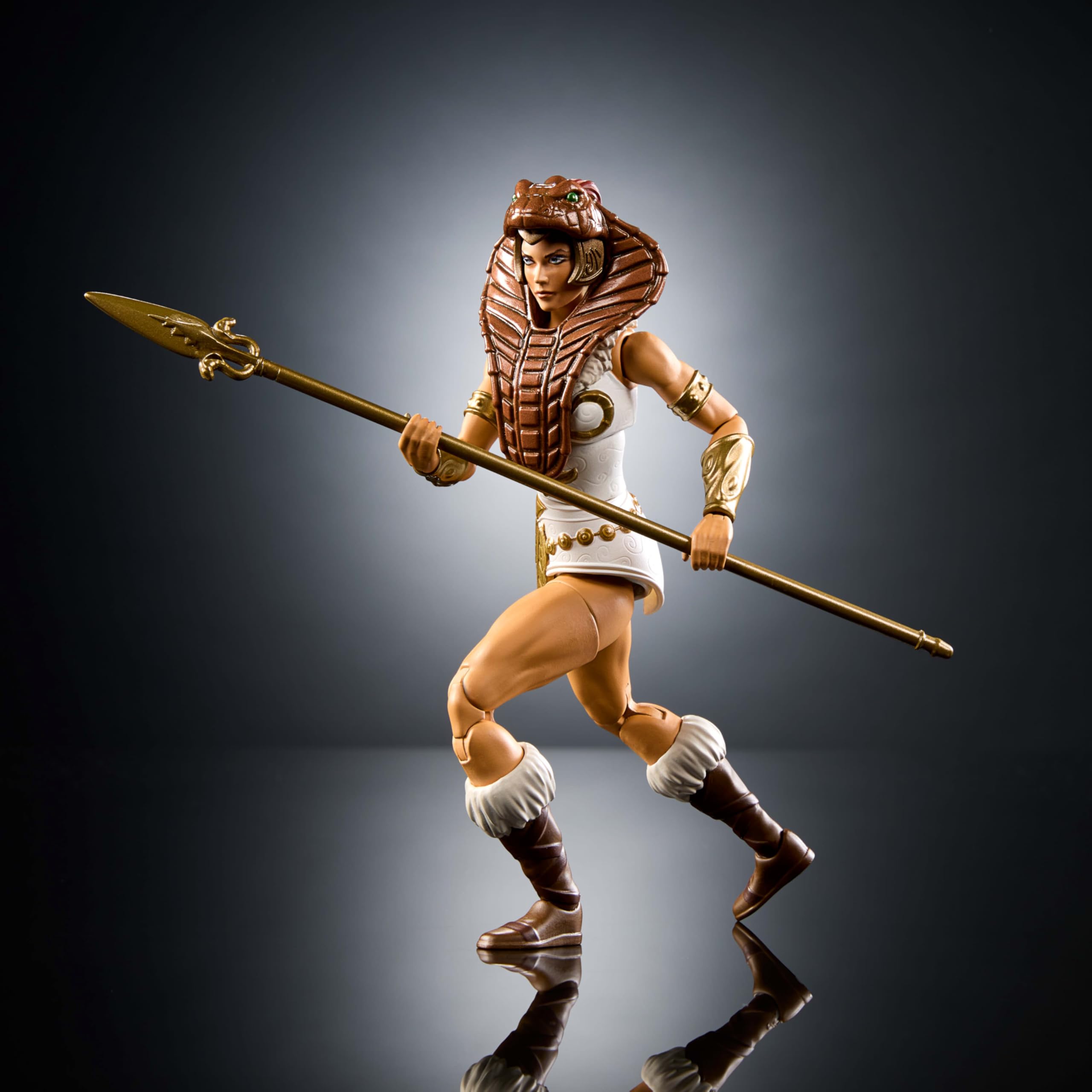 Teela with removable cobra hood offering customizable New Eternia styling.