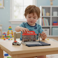 Child interacts with the Action Drivers Pizza Hut set