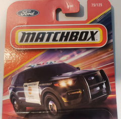 Matchbox Ford Police Interceptor Utility diecast, side view, great for imaginative play.