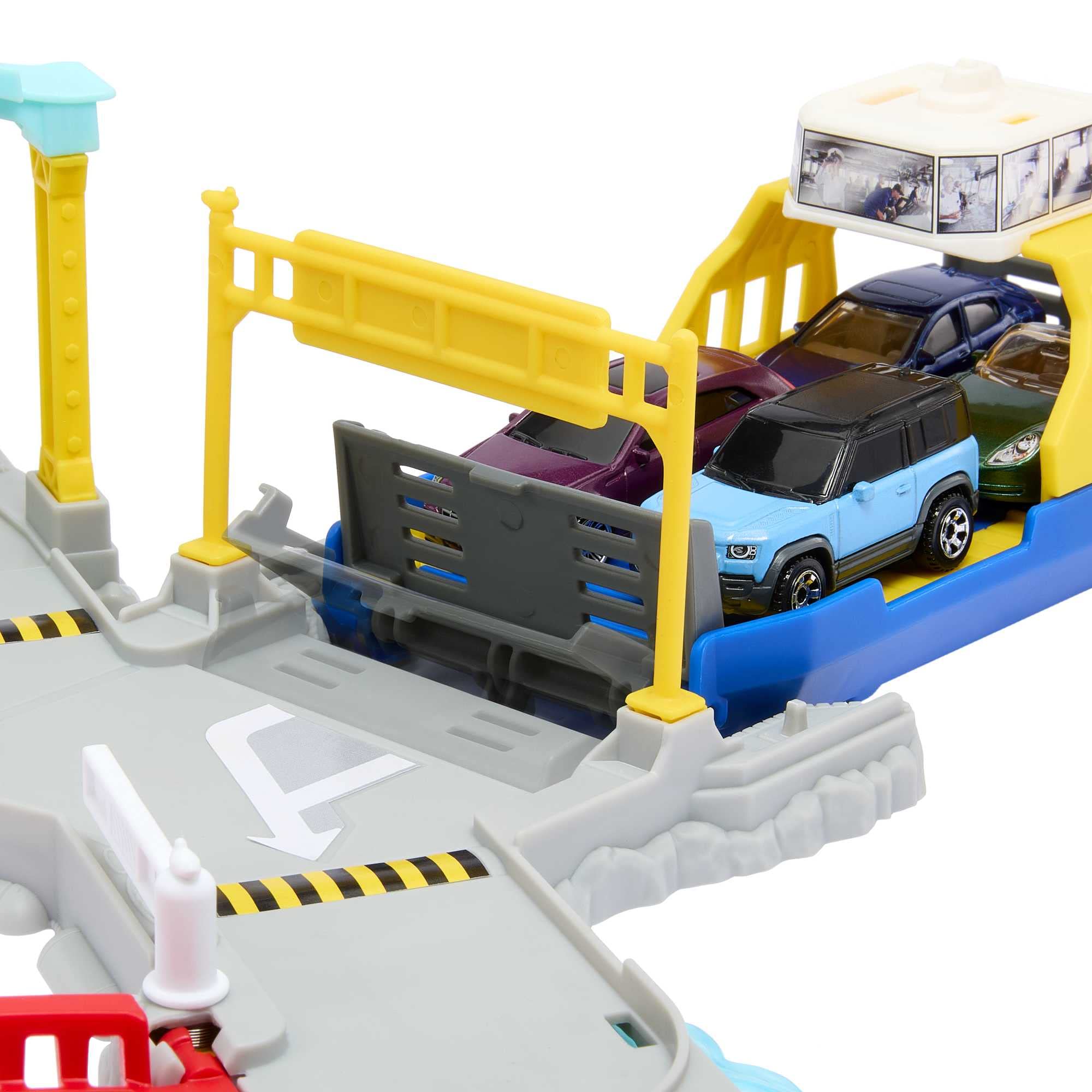 Terminal transport play with cars moving between ports in the Matchbox set.