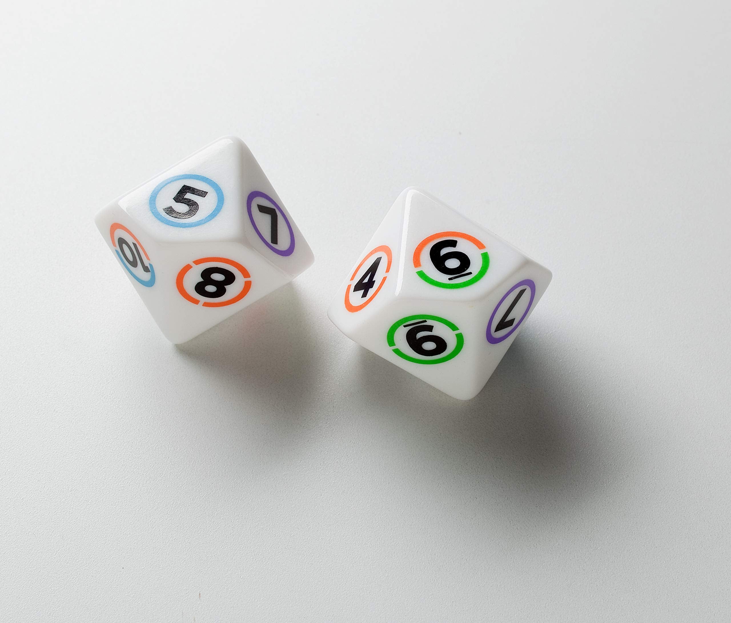 Tiles color-coding emphasizes multiplication, division, and factorization concepts.