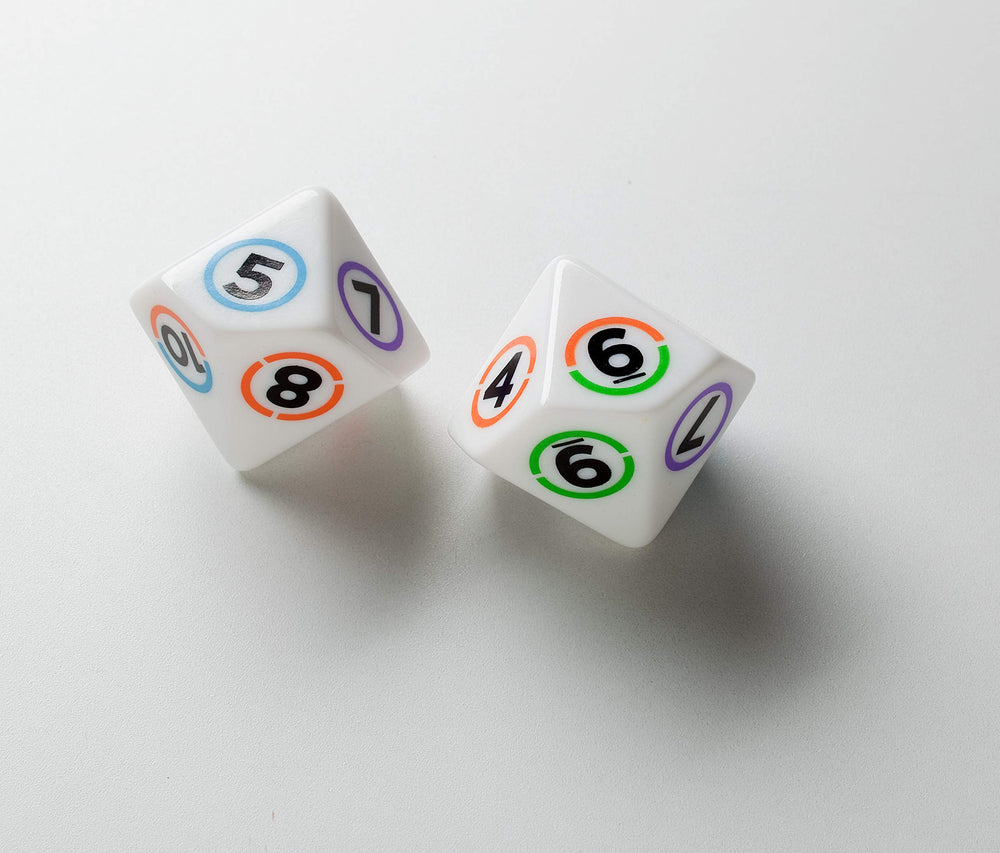 Tiles color-coding emphasizes multiplication, division, and factorization concepts.