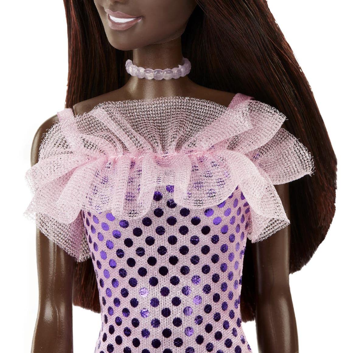 Mattel Barbie doll in a glamorous nighttime outfit sparks imaginative dress-up adventures.