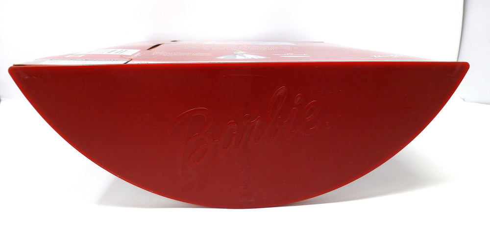 Mattel Barbie Holiday Celebration 2001 stands on a doll stand for secure display.