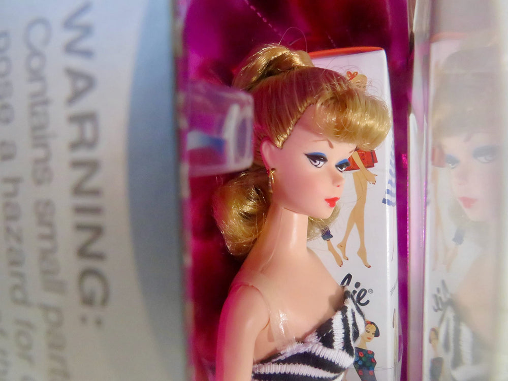 Mattel Barbie Original 1959 Blonde Doll back view, authentic vintage styling.