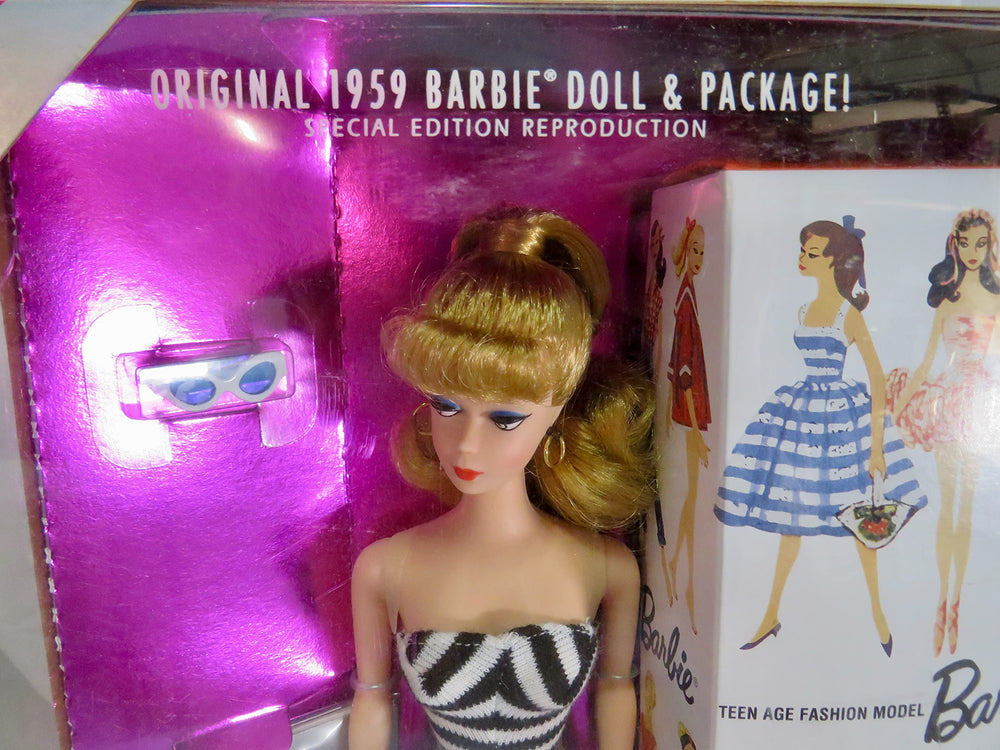Mattel Barbie Original 1959 Blonde Doll front view, nostalgic display piece.
