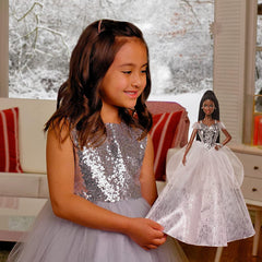 Barbie Signature 2021 Holiday doll with braided hair, offering a timeless salon-style look.