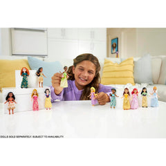 Mattel Belle in yellow gown with iconic styling for pretend fashion.