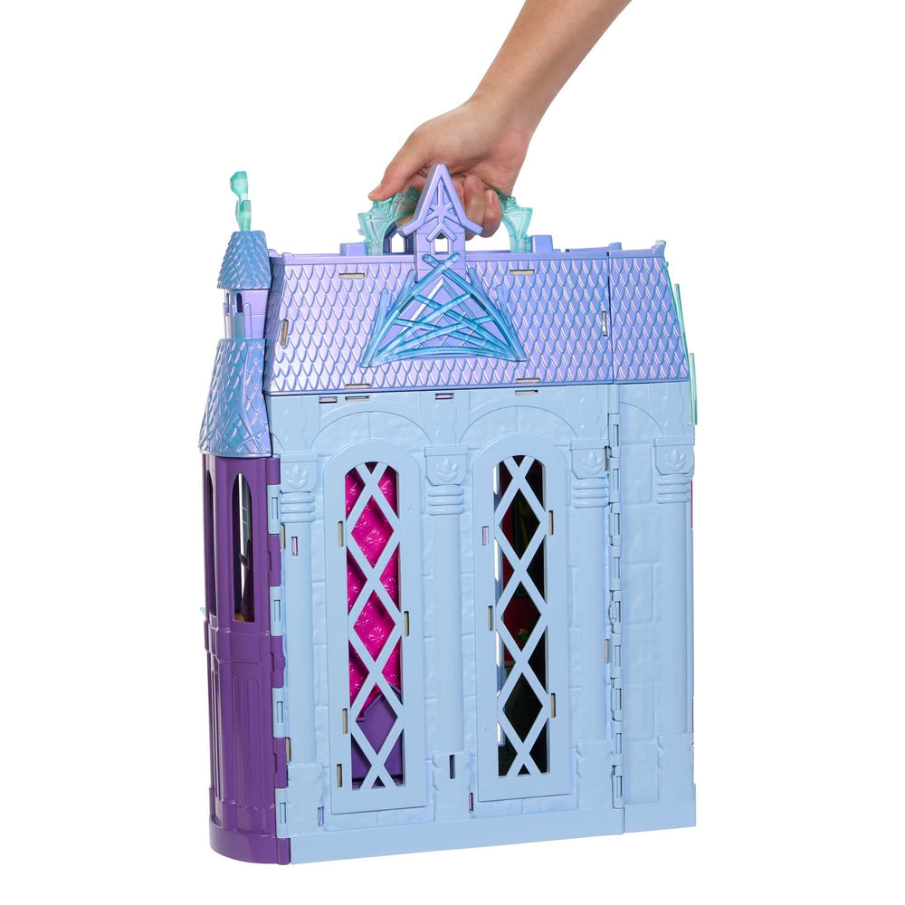 Dining area in Arendelle Castle with table, chairs, and pretend food