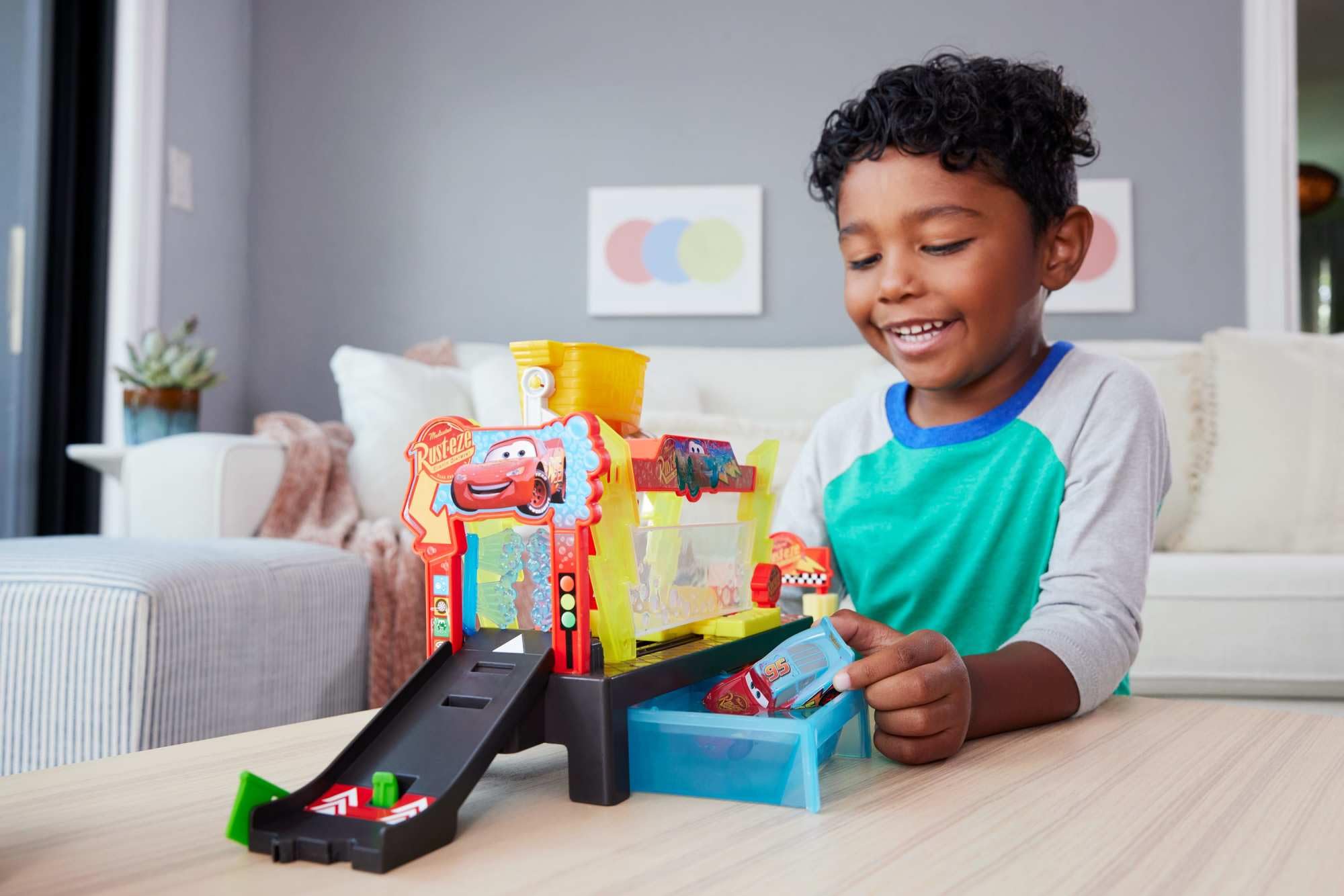 Mattel Disney Pixar Cars race ramp view with green flag for action-packed play.