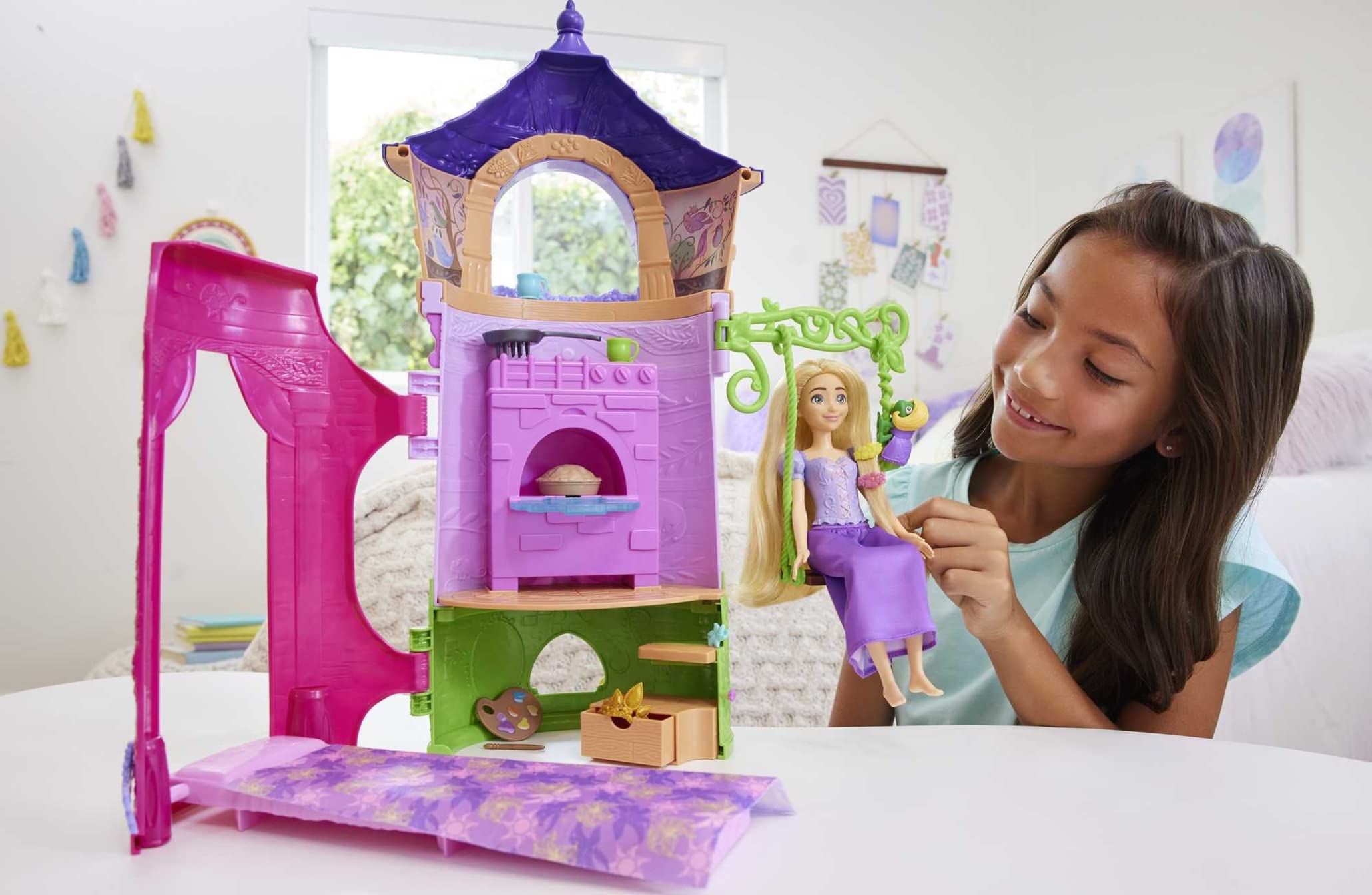 Rapunzel doll in purple gown with long hair and styling brush