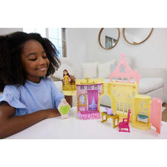 Mattel Belle's Castle Storytime Stackers open dollhouse reveals cozy play areas for shared imaginative play.