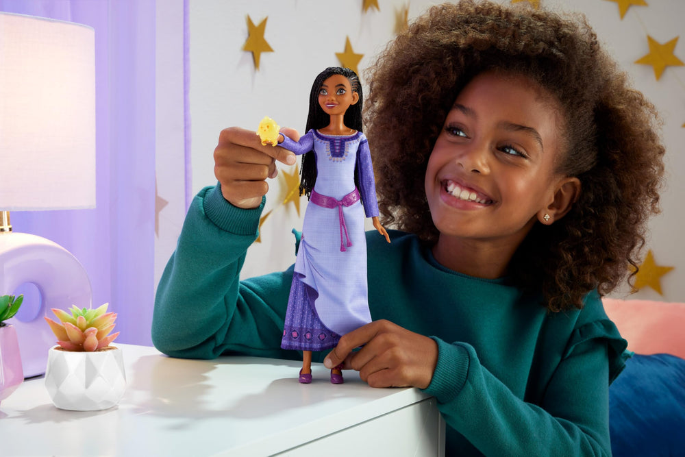 Asha doll with removable dress and shoes for mix-and-match fashion play.