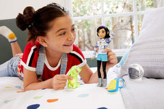 Mattel Fei Fei doll with astronaut helmet for space themed storytelling.
