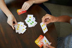 Mattel Games Blink two players race to empty hands for fast rounds.