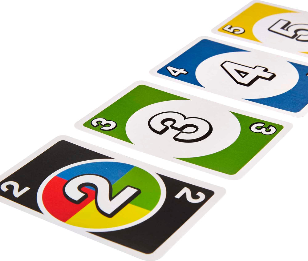 Family game night scene with the decorative tin and three card games.