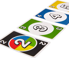 Family game night scene with the decorative tin and three card games.