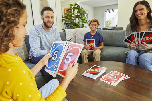 Mattel Games Giant UNO color-blind-symbols support inclusive play for color-conscious players.