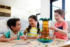 Mattel Games KerPlunk tree tower rocks during playtime.