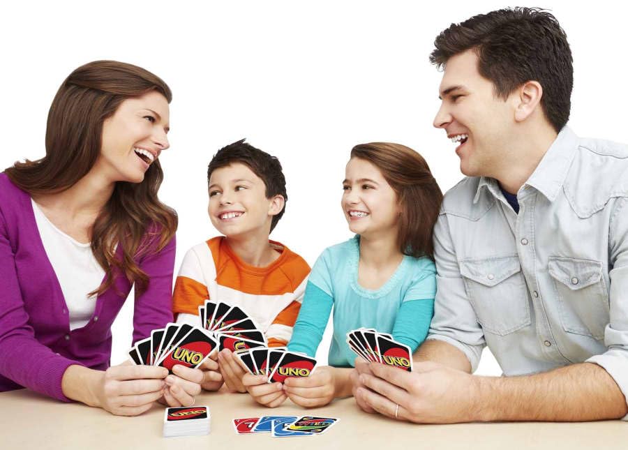Mattel Games UNO draw-two card adding suspense and strategic pressure.
