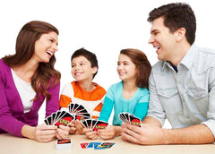 Mattel Games UNO draw-two card adding suspense and strategic pressure.