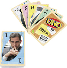 Wild and penalty cards spread on table with Office flair