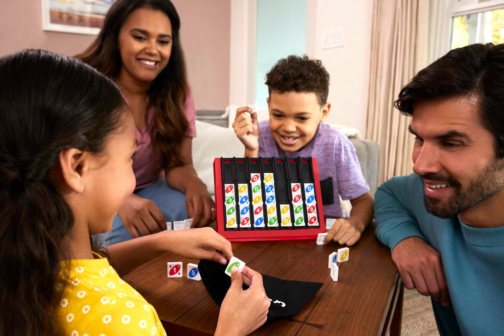 Mattel Games UNO Quatro tiles close-up show bright colors for fast, family-friendly rounds.