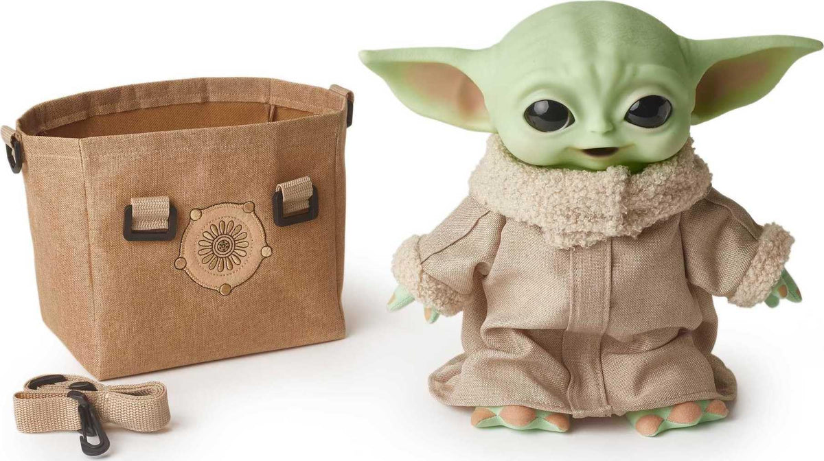 Mattel Grogu plush 11-inch toy, soft and huggable for playtime.